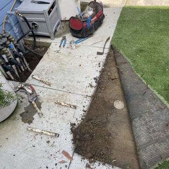 Picture Build - identifying the leaking line and accessing the separate line underneath the artificial turf. - Pool & Hot Tub Service Near Me - Sylmar, California Picture Build - identifying the leaking line and accessing the separate line underneath the artificial turf. - Pool & Hot Tub Service Near Me - Sylmar, California