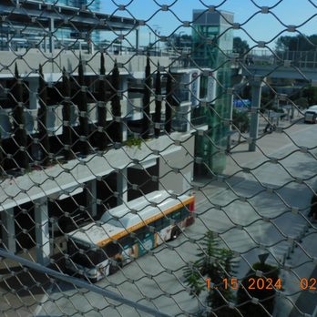 MTS - UTC Transit Center - With the Trolley it passes by and the many buses come and go at the front and the side of the parking structure. - Bus Stations Near Me