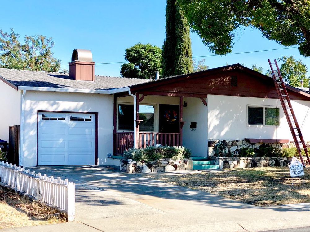 Slide of V Mendoza Roofing