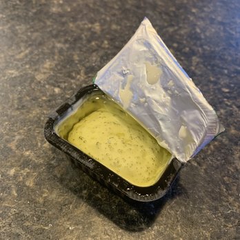Pizza Hut - a plastic container filled with cheese - Pizza Near Me - Carson City, Nevada