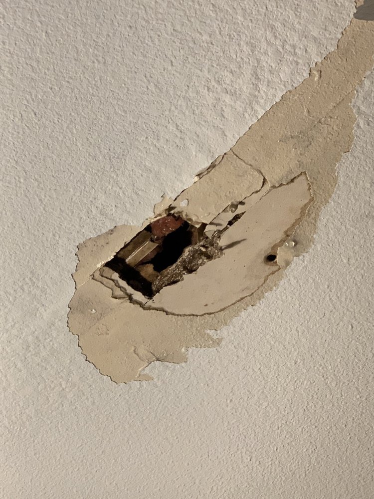 Slide of Sutton Roofing and Solar