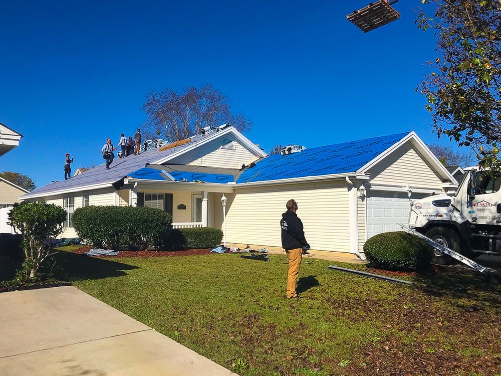 Slide of Total Roofing Solutions & Construction