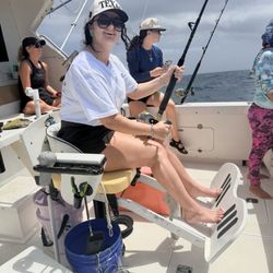 KonKlma Fishing Charters - Daughter bringing in her barracuda.