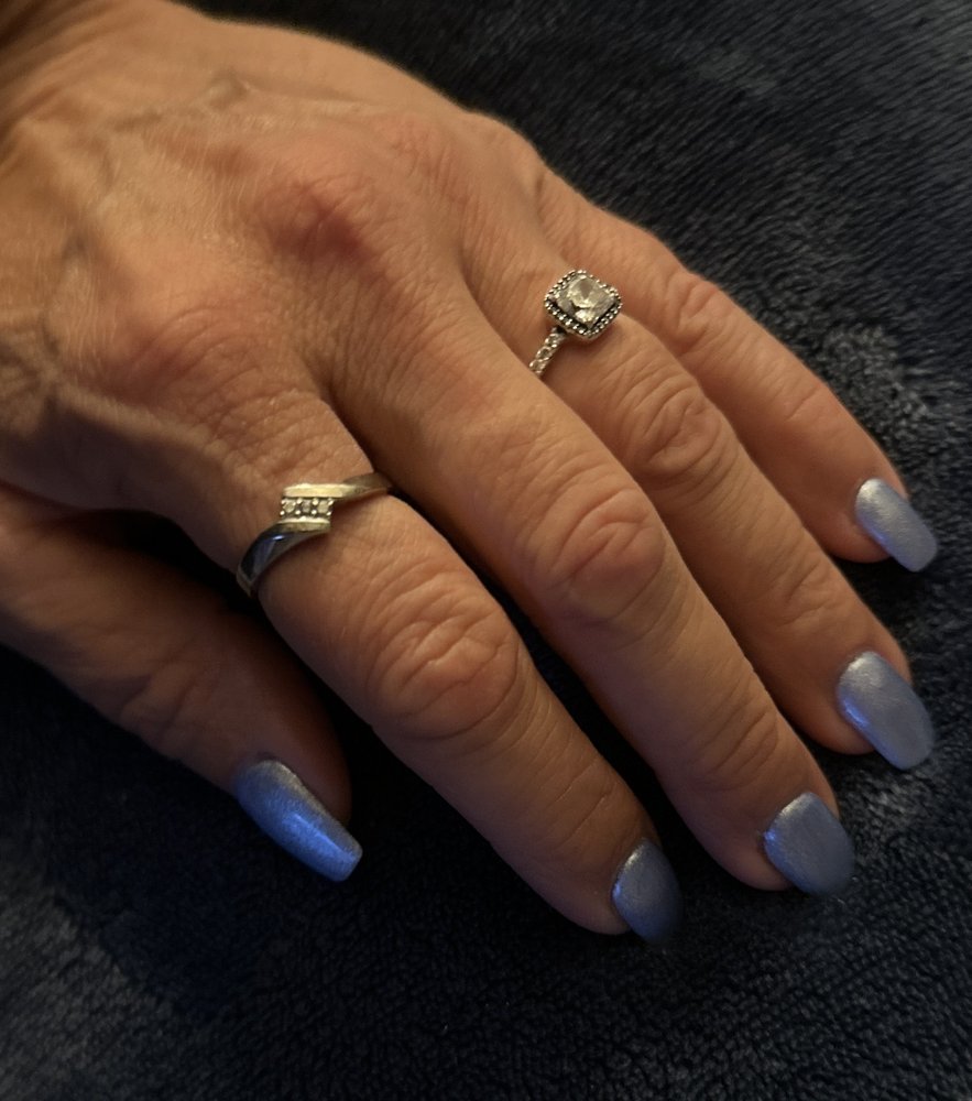 Pinkies N Toes Nail Studio Logo