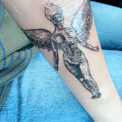Metamorphosis - Forearm tattoo done by lyndsy