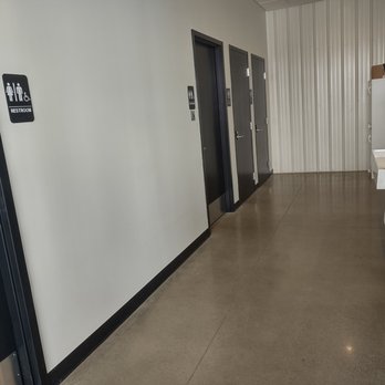 OMNI Winery and Taproom - Four individual bathrooms. Not pictured on the right is the sinks - Brewpubs Near Me - Rosemount, Minnesota OMNI Winery and Taproom - Four individual bathrooms. Not pictured on the right is the sinks - Brewpubs Near Me - Rosemount, Minnesota