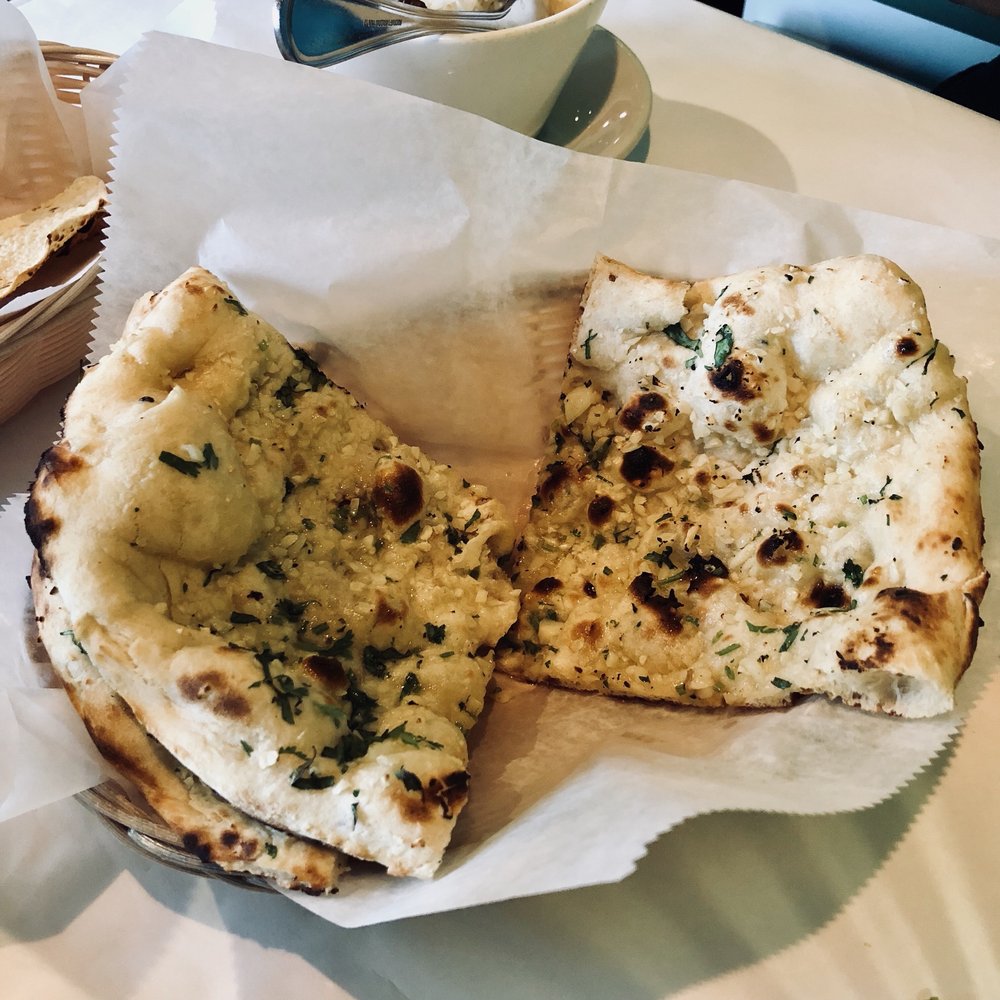Order Garlic Naan food online from Utsav Indian Cuisine store, Vernon on bringmethat.com
