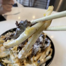 Bulgogi Cheese Fries with Garlic Aioli Sauce. Not o. The menu but it shows up when you order from their kiosk Bulgogi Cheese Fries with Garlic Aioli Sauce. Not o. The menu but it shows up when you order from their kiosk
