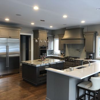 Trim It Up - a kitchen with a center island - Painters Near Me - Carmel, Indiana Trim It Up - a kitchen with a center island - Painters Near Me - Carmel, Indiana