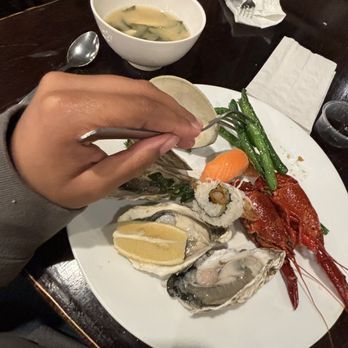 Royal Buffet - oyster, salmon nigiri, crawfish, green beans and miso soup and steamed clam blocked by my hand - Buffets Near Me - Hoffman Estates, Illinois