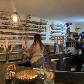 Lazy Hiker Brewing - a woman at the bar - Beer Bar Near Me - Sylva, North Carolina