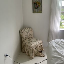 Tattered and ripped chair cover as soon as we entered.