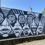 Photo of Black And White Faces Mural