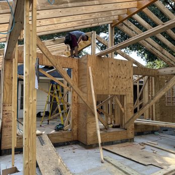 Great Deal Construction - a construction worker working on a house - Framing Near Me Great Deal Construction - a construction worker working on a house - Framing Near Me