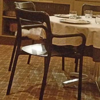 Bacchanalia - Uncomfortable chairs with high back but nothing to support your back. Style is good, dining comfort not good. - New American Near Me - Atlanta, Georgia