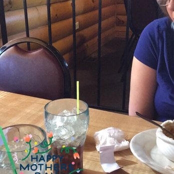 Gosh Dam Place - a woman sitting at a table with food - Bars Near Me - Deer River, Minnesota Gosh Dam Place - a woman sitting at a table with food - Bars Near Me - Deer River, Minnesota