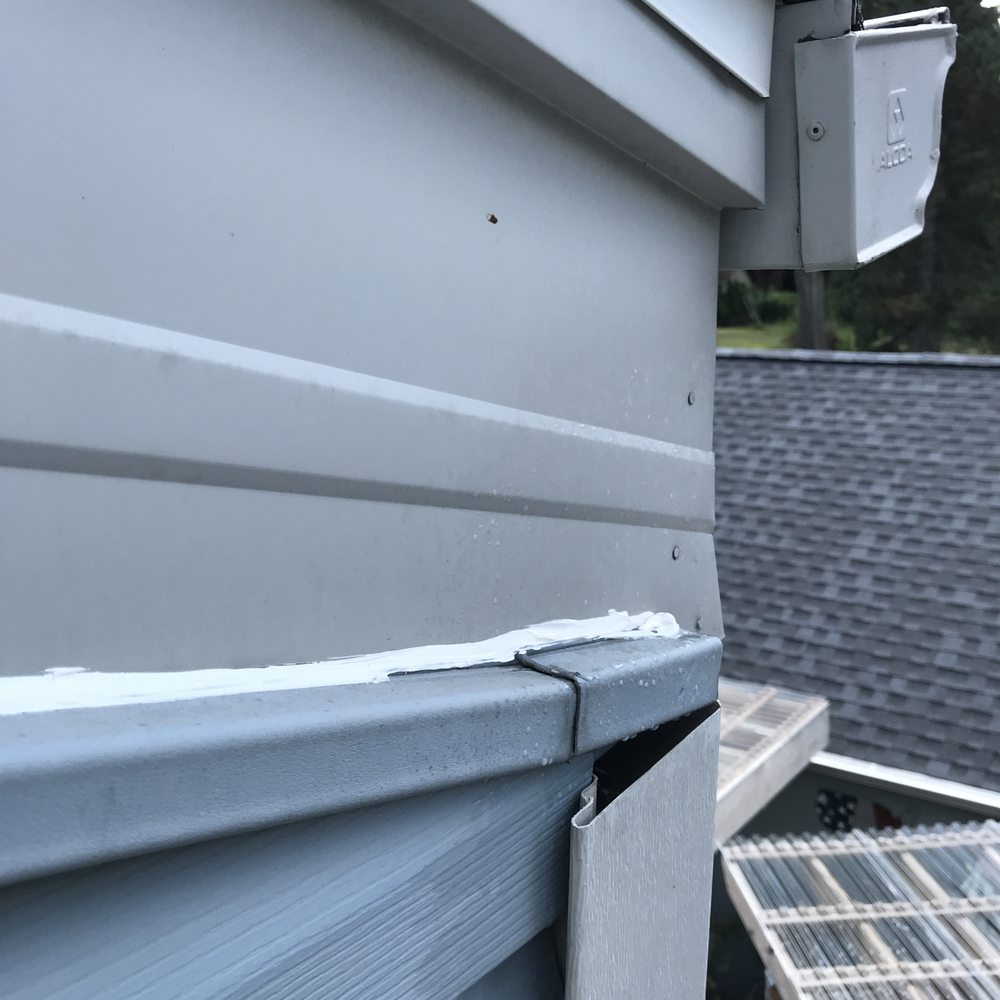 Budget Exteriors - Bee hive was nested behind this and not sealed to keep water out - Windows Installation Near Me - Bloomington, Minnesota Budget Exteriors - Bee hive was nested behind this and not sealed to keep water out - Windows Installation Near Me - Bloomington, Minnesota