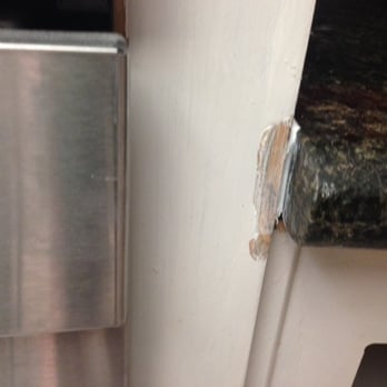 Stone Depot & More - Cabinet damage left by installers.  Photo posted per Sean at Stone Depot's request. - Cabinetry Near Me - Carlsbad, California