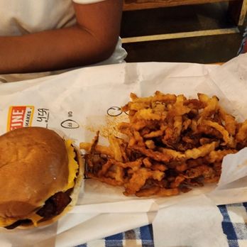Mighty Fine Burgers University Oaks - Cheeseburger and fries - Burgers Near Me - Round Rock, Texas