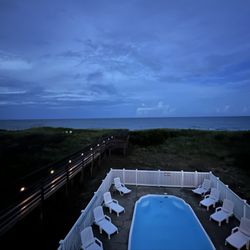 Southern Shores Realty - The view of the pool and the ocean off the back deck of our rental. Very nice!