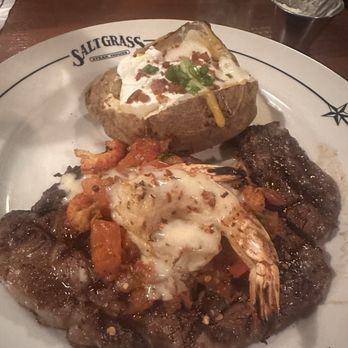 Saltgrass Steak House - Cajun steak with tomatoes on top, green onions and shrimp! - Steakhouses Near Me - Laughlin, Nevada