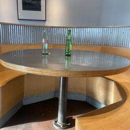 Dirty empty table with empty used bottles. Dirty empty table with empty used bottles.
