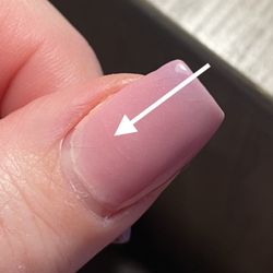 Stable crack, awful cuticle edge (11 day old dip manicure.) FYI: dip powder is temperature sensitive... pink when warm, indigo when cold.