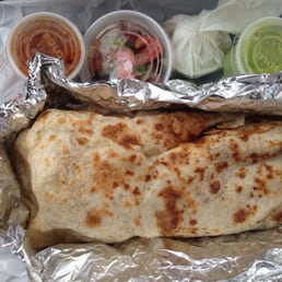 Asada burrito with pico de gallo and green and red sauces on the side. $8. Huge meal!
