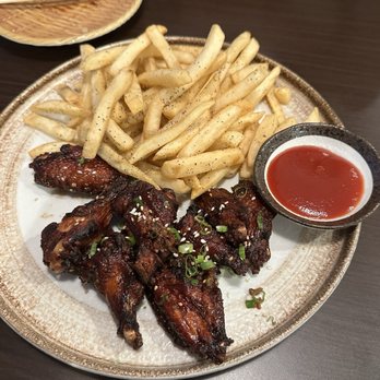 Rain Bistro - Chinese Garlic Sauce Wings, fries, and ketchup - Asian Fusion Near Me - Tampa, Florida Rain Bistro - Chinese Garlic Sauce Wings, fries, and ketchup - Asian Fusion Near Me - Tampa, Florida