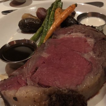 The Vineyard Rose Restaurant - Angus Prime Rib with herb roasted pee wee potatoes, vineyard vegetable, au jus and creamy horseradish. - New American Near Me - Temecula, California The Vineyard Rose Restaurant - Angus Prime Rib with herb roasted pee wee potatoes, vineyard vegetable, au jus and creamy horseradish. - New American Near Me - Temecula, California