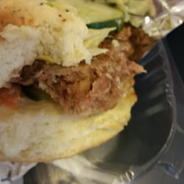 a chicken sandwich in a plastic container
