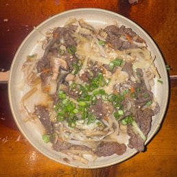 Sam Cha's mediocre liquidy Bulgogi appetizer, lacking any lettuce wrap, etc. Sam Cha offers no opportunity for grilling bulgogi at table. Sam Cha's mediocre liquidy Bulgogi appetizer, lacking any lettuce wrap, etc. Sam Cha offers no opportunity for grilling bulgogi at table.