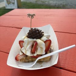 Grandma's Waffles & Coffee - Ultimate waffle with strawberry's and syrup