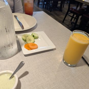 Aga's Restaurant & Catering - Complimentary cucumber and carrot slices with sauce. Mango Lassi and Fizzy Berry - Pakistani Near Me - Houston, Texas Aga's Restaurant & Catering - Complimentary cucumber and carrot slices with sauce. Mango Lassi and Fizzy Berry - Pakistani Near Me - Houston, Texas