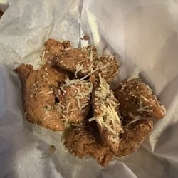 The Old Bag of Nails Pub - Garlic parm boneless wings