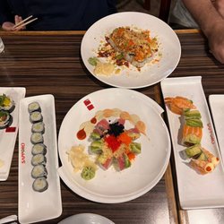 Sapporo - (From Left to Right) veggie roll, cucumber roll, (top) volcano roll, (bottom) Christmas roll, orange dragon roll, avocado roll