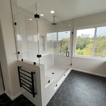 Design In Elegance - a bathroom with a large shower - Glass & Mirrors Near Me Design In Elegance - a bathroom with a large shower - Glass & Mirrors Near Me
