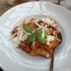 Villa Weil - No. 236: Pasta with chicken, zucchini, basil, tomato sauce and shaved parmigiana on top.