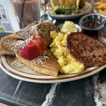 The Wayward Cafe - French toast, surprise, strawberries with a surprise and a sausage on the side and and fake eggs and a sausage nine out of 10 - Breakfast & Brunch Near Me - Seattle, Washington The Wayward Cafe - French toast, surprise, strawberries with a surprise and a sausage on the side and and fake eggs and a sausage nine out of 10 - Breakfast & Brunch Near Me - Seattle, Washington