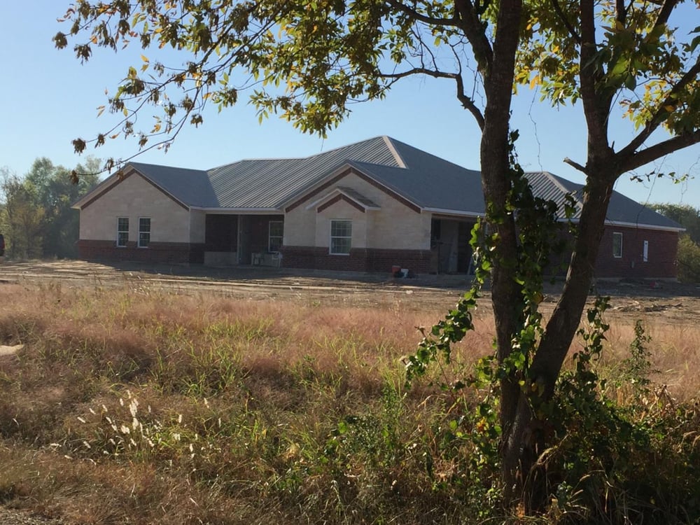 Slide of Tague Design Roofing