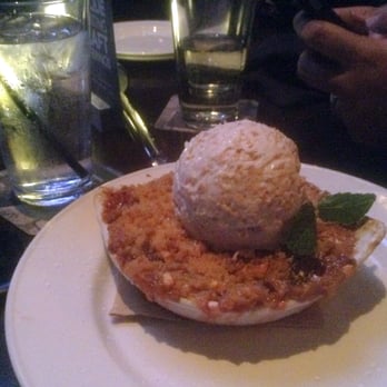 Yard House - DELICIOUS berry banana macadamia nut crumble with coconut ice cream - good portion size for two - New American Near Me - Rancho Cucamonga, California Yard House - DELICIOUS berry banana macadamia nut crumble with coconut ice cream - good portion size for two - New American Near Me - Rancho Cucamonga, California