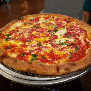 Zoli's NY Pizza - Their signature cheese pizza - Pizza Near Me - Addison, Texas Zoli's NY Pizza - Their signature cheese pizza - Pizza Near Me - Addison, Texas