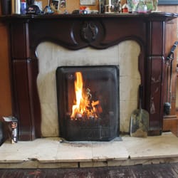 Mulcaire's Barber Shop - The Fireplace roars on