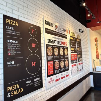 Your Pie Pizza - menus on a brick wall - Pizza Near Me - Melbourne, Florida