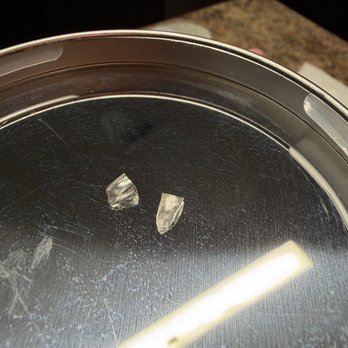 Sullivan's Steakhouse - The two pieces of glass or plastic I found in my food. They were either in the steak or in the bleu cheese topping I had added to my steak - Steakhouses Near Me - Charlotte, North Carolina Sullivan's Steakhouse - The two pieces of glass or plastic I found in my food. They were either in the steak or in the bleu cheese topping I had added to my steak - Steakhouses Near Me - Charlotte, North Carolina