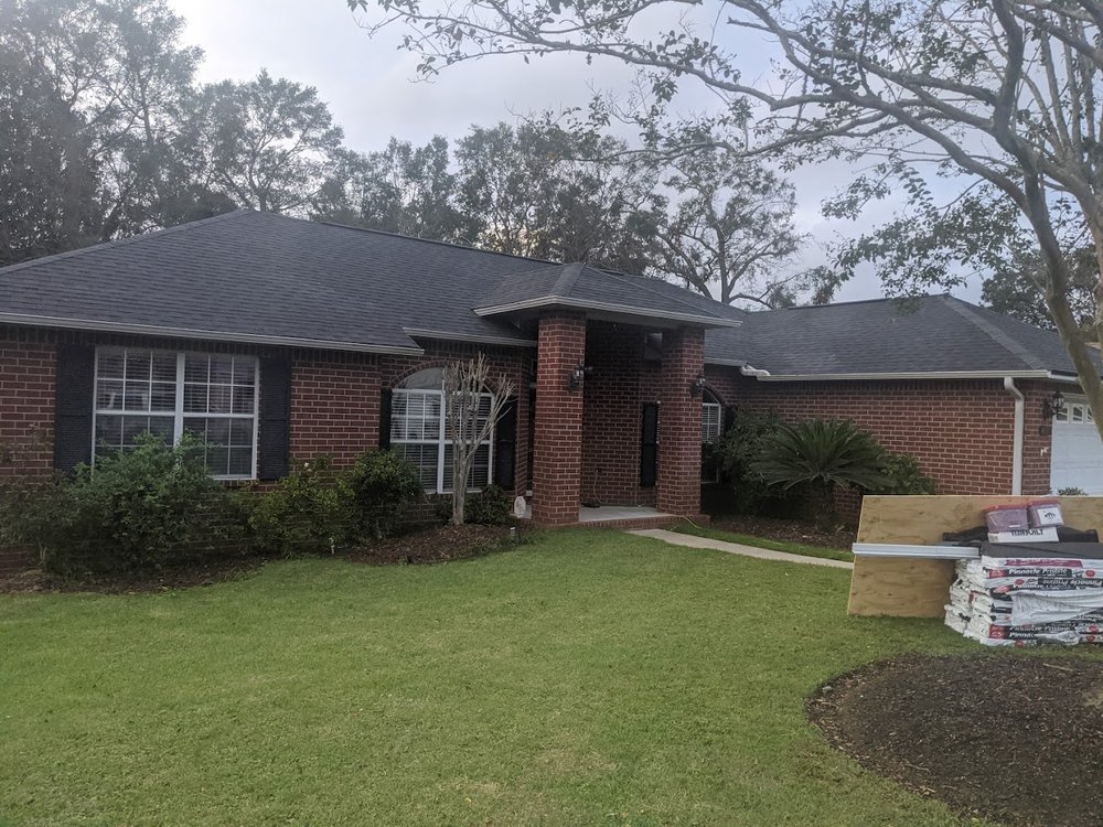 Slide of H.E. Roberts Roofing