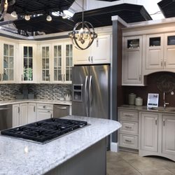 PC Home Center - White cabinets and gray island - so in these days!