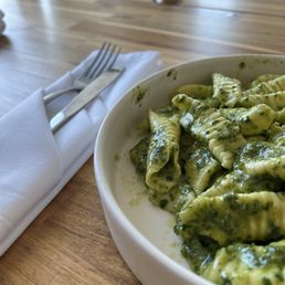 handmade penne pasta with pesto