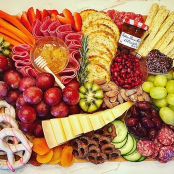 Lux Boards - a platter of fruit, cheese, crackers, and crackers - Food Delivery Services Near Me