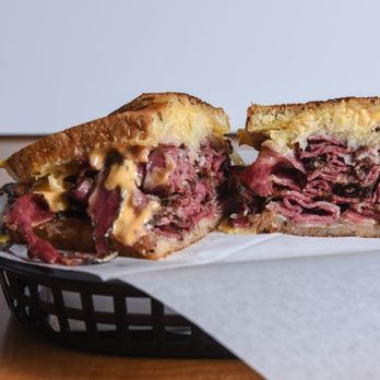 Water Shack - Pastrami Reuben on Rye, includes over 1/4lb pastrami, Swiss cheese, 1000 Island Dressing and hot sauerkraut. Make it a meal if you dare! - Water Stores Near Me - Vista, California Water Shack - Pastrami Reuben on Rye, includes over 1/4lb pastrami, Swiss cheese, 1000 Island Dressing and hot sauerkraut. Make it a meal if you dare! - Water Stores Near Me - Vista, California